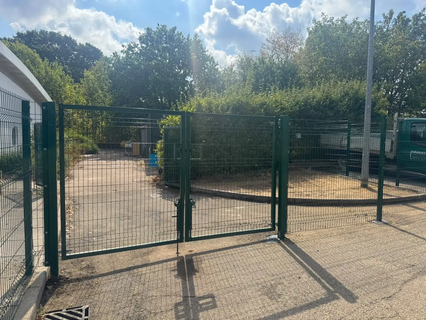 Double-leaf green welded mesh security gates, fitted by Tyrrells